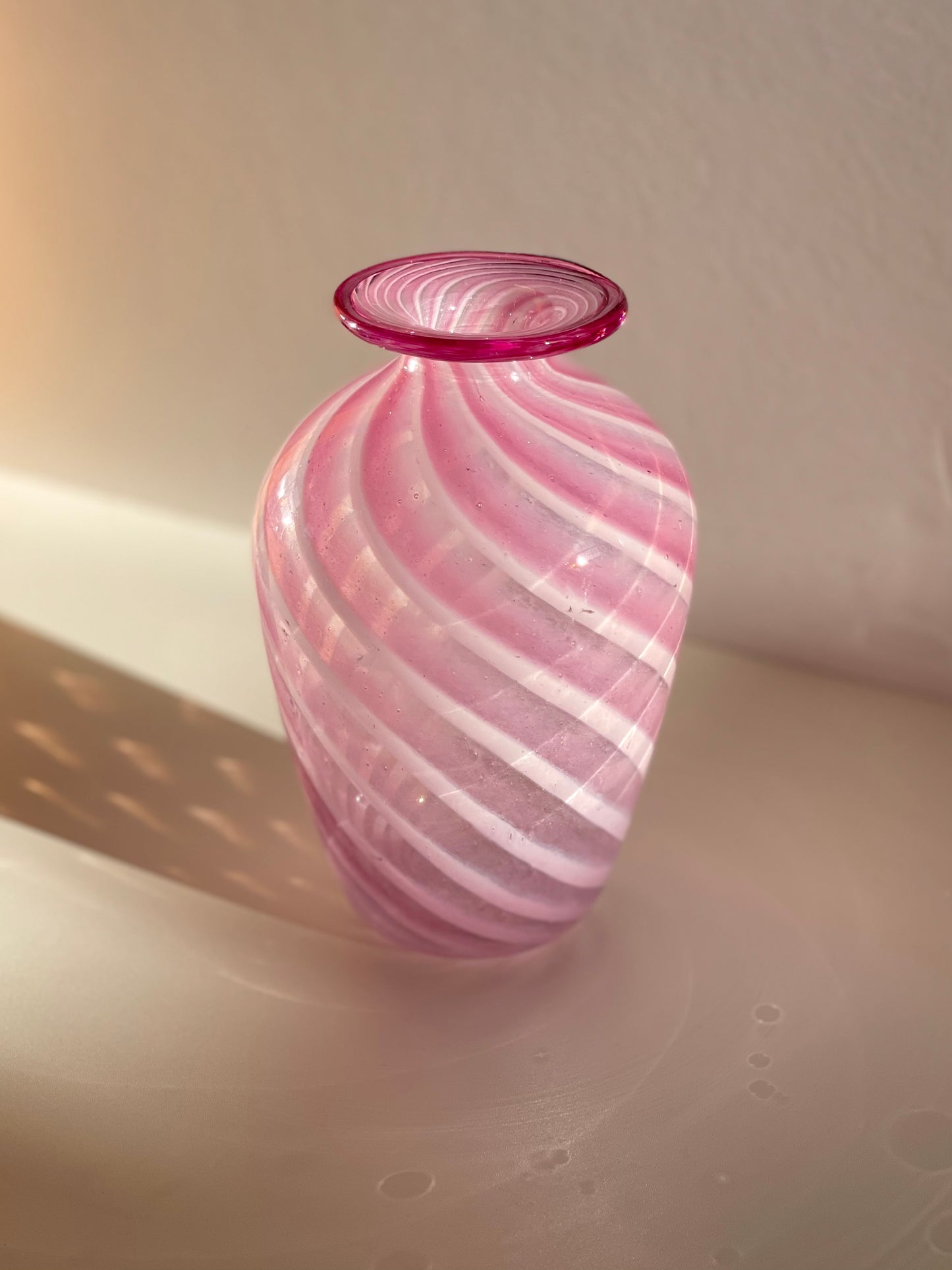 Pink hand blown swirl vase