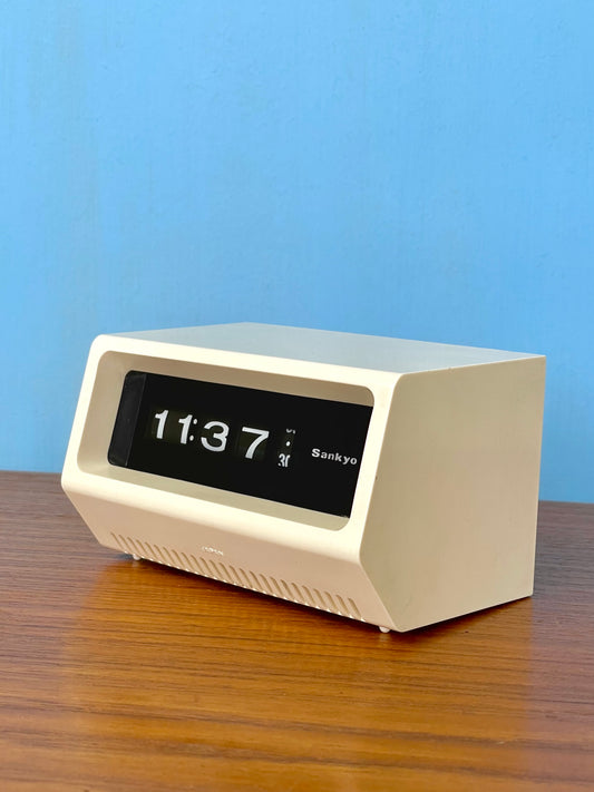 Ivory Sankyo roll clock