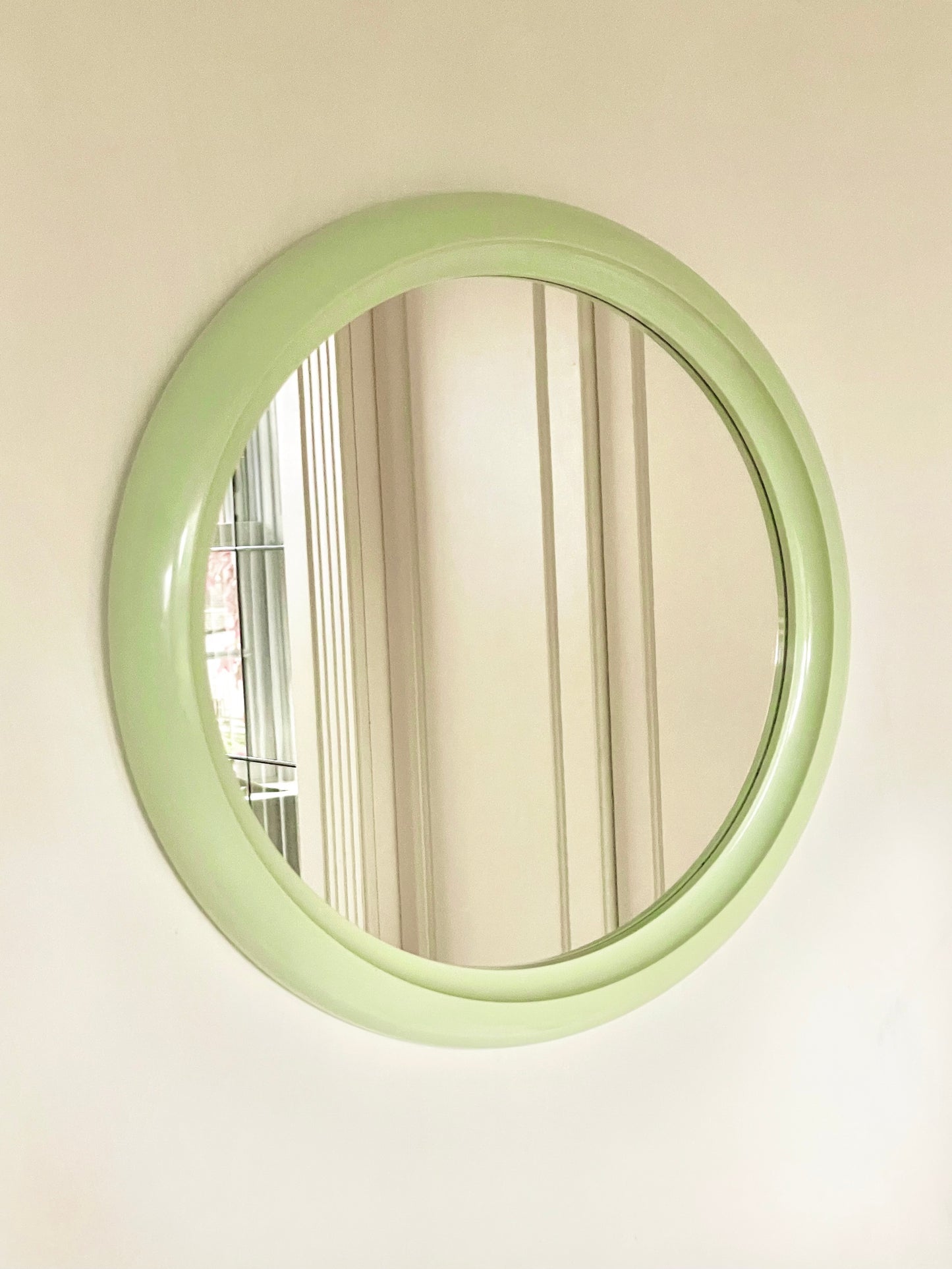 Green 70’s round mirror