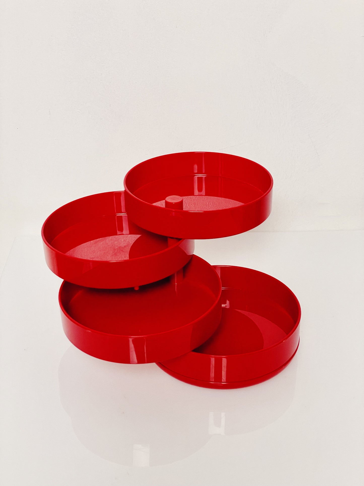 Red swivel desk tidy