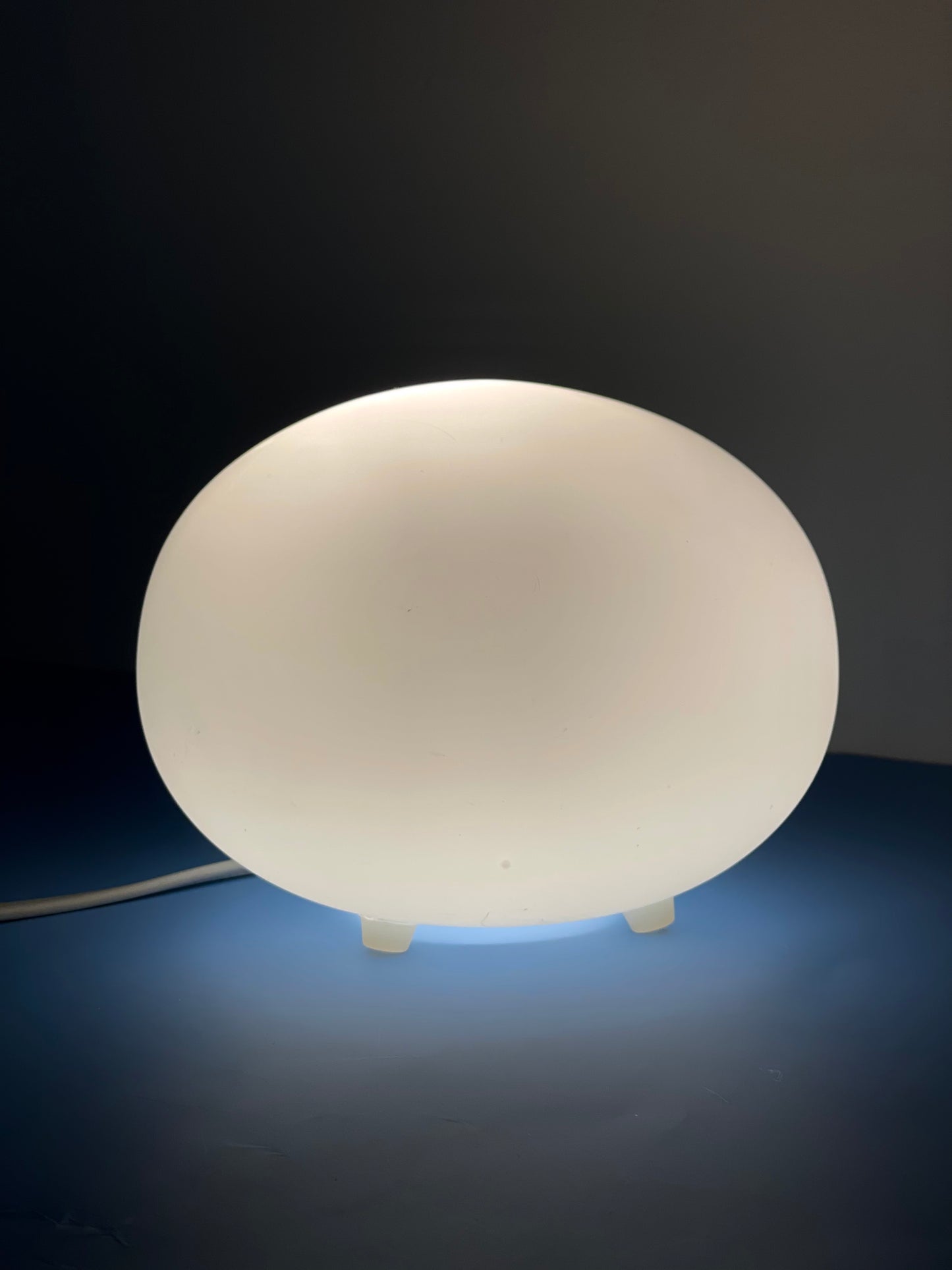 Small glass pebble shaped lamp