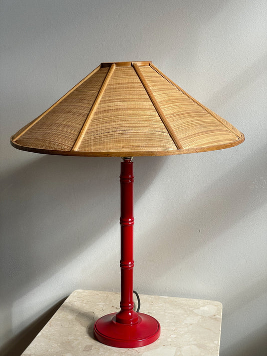 Red faux bamboo lamp with wicker shade