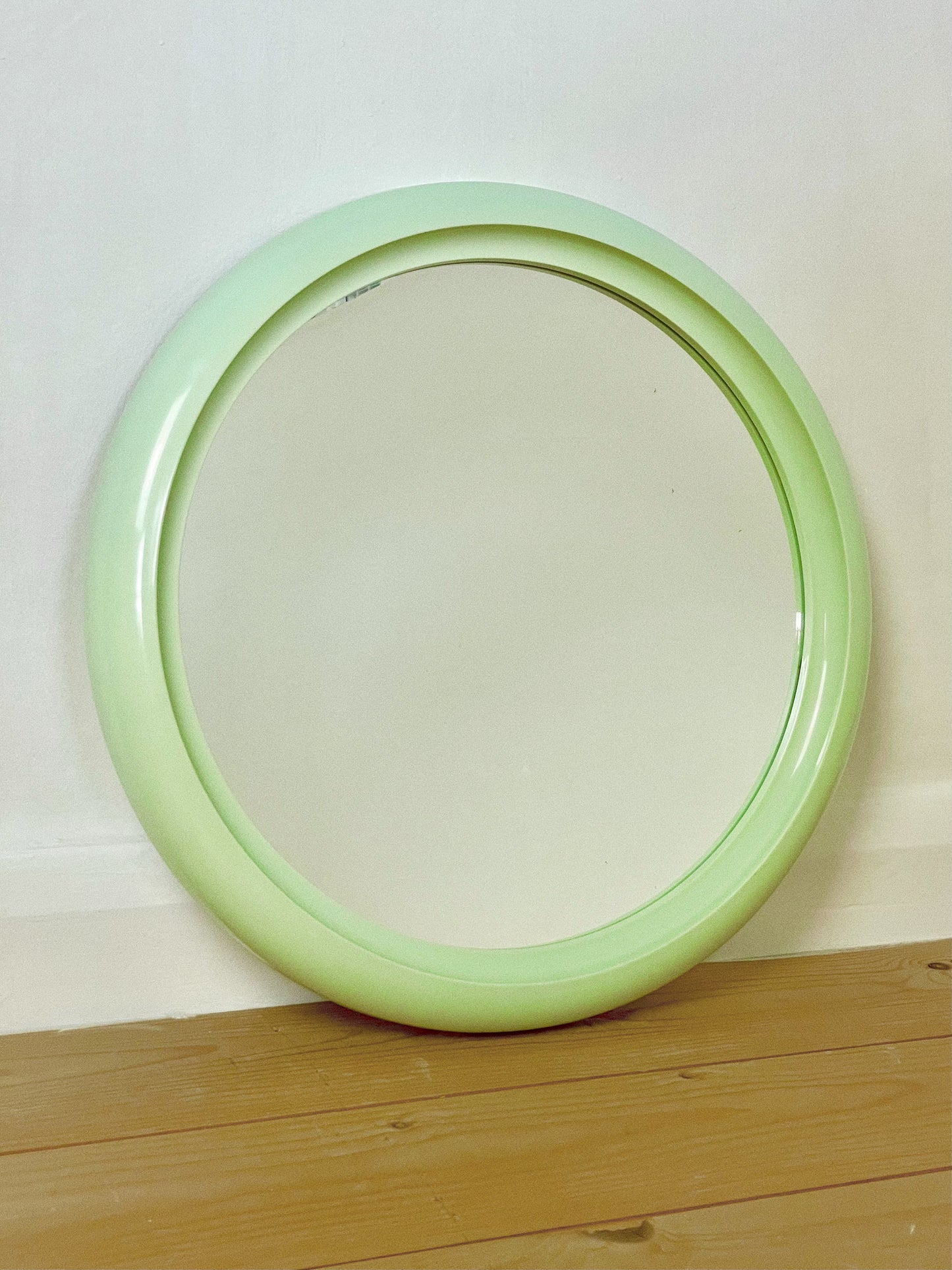 Green 70’s round mirror