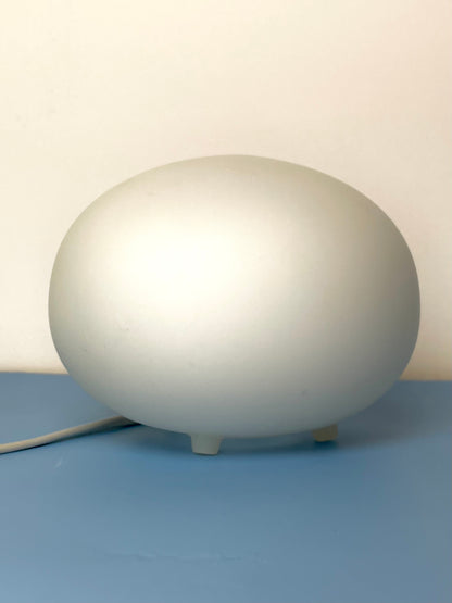 Small glass pebble shaped lamp