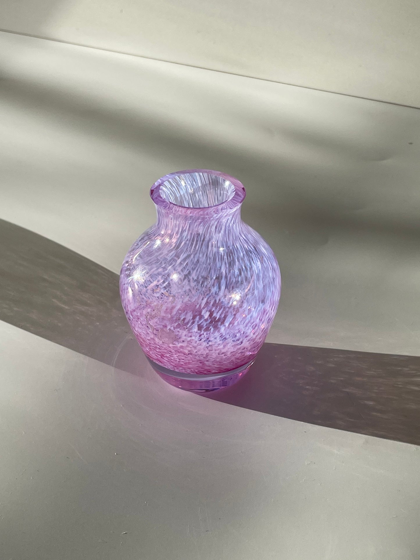 Small pink/purple glass pot