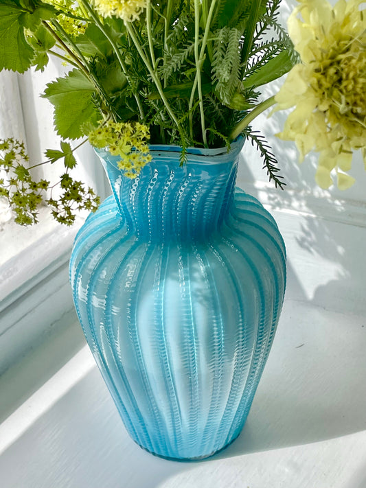 Antique blue glass ribbed cased vase