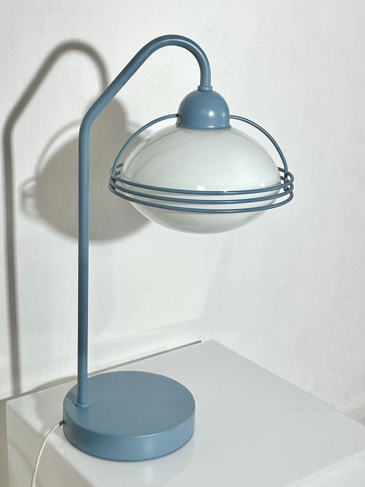 Caged globe swan neck lamp by ‘Massive’ of Belgium