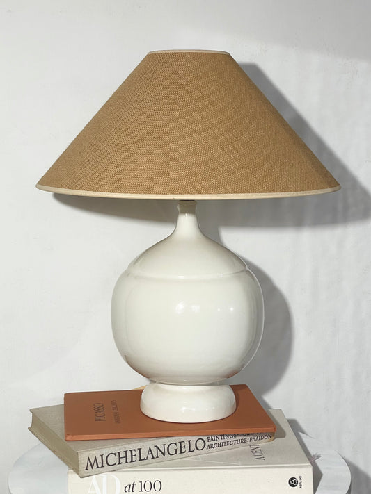 Heavy ceramic bulbous lamp base and hessian shade