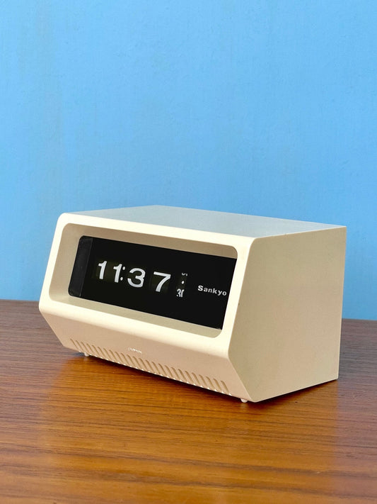 Sankyo roll clock in ivory