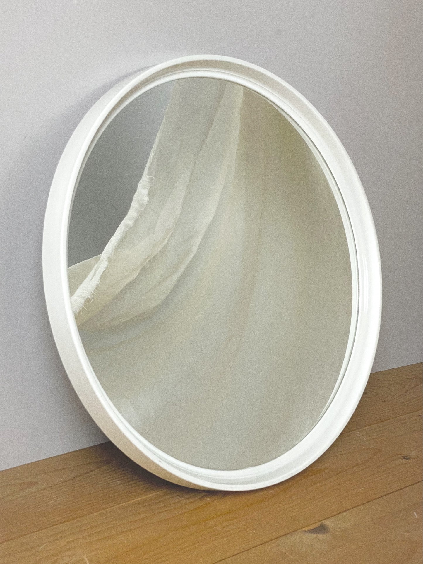 70’s round mirror