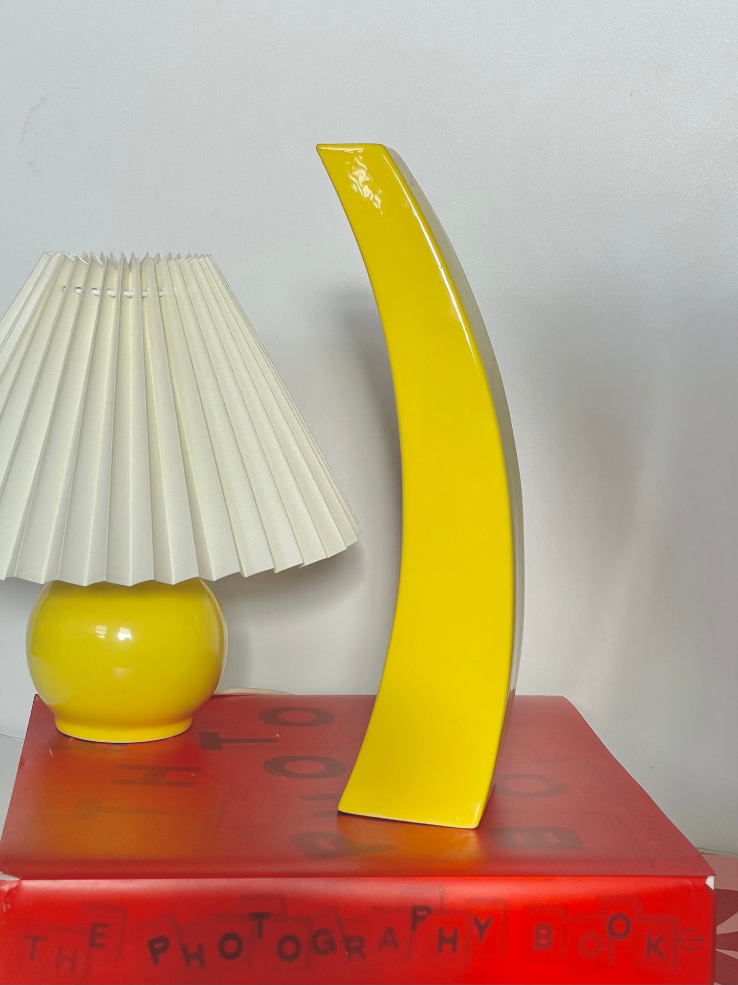 Memphis style curved yellow vase