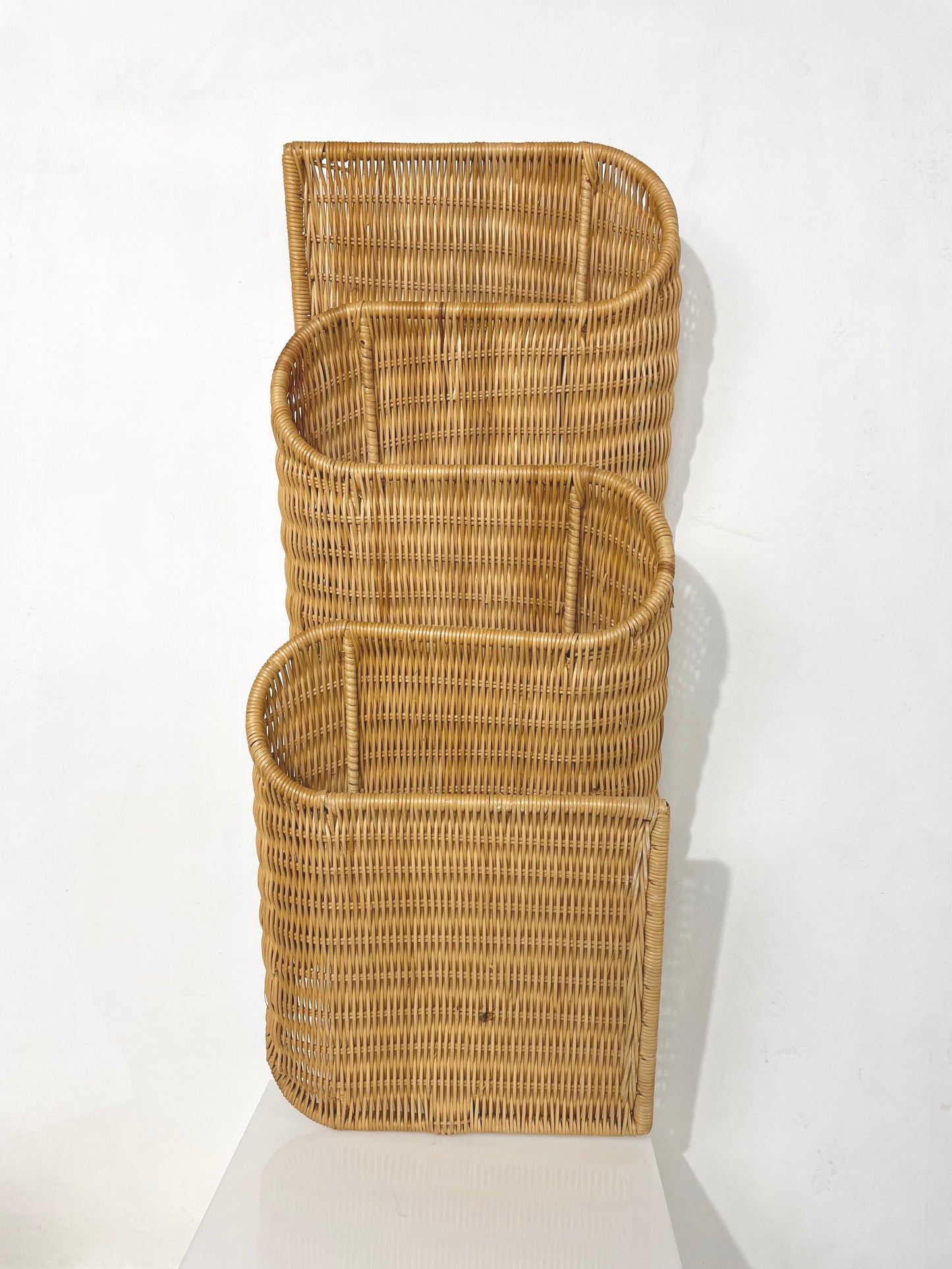 Wavy wicker magazine rack