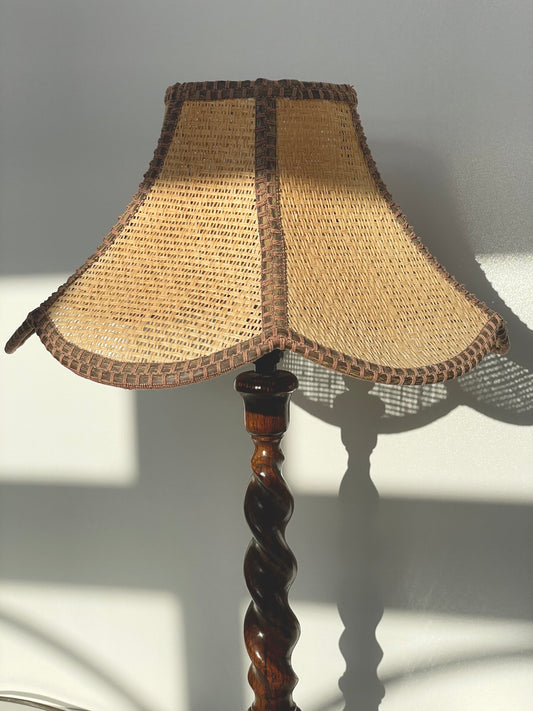 Dark oak barley sugar twist lamp with rattan shade