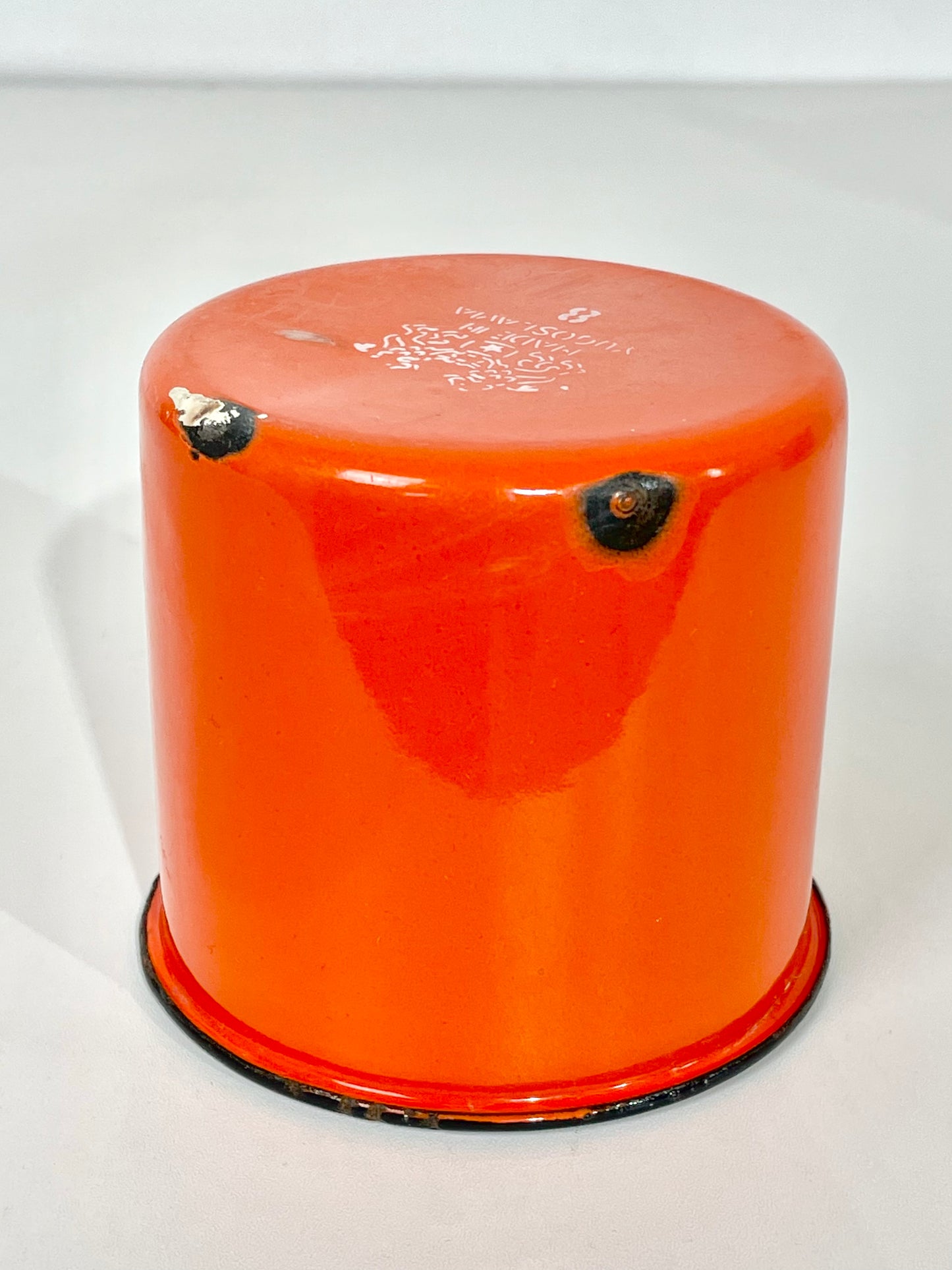 Deep orange enamel cup